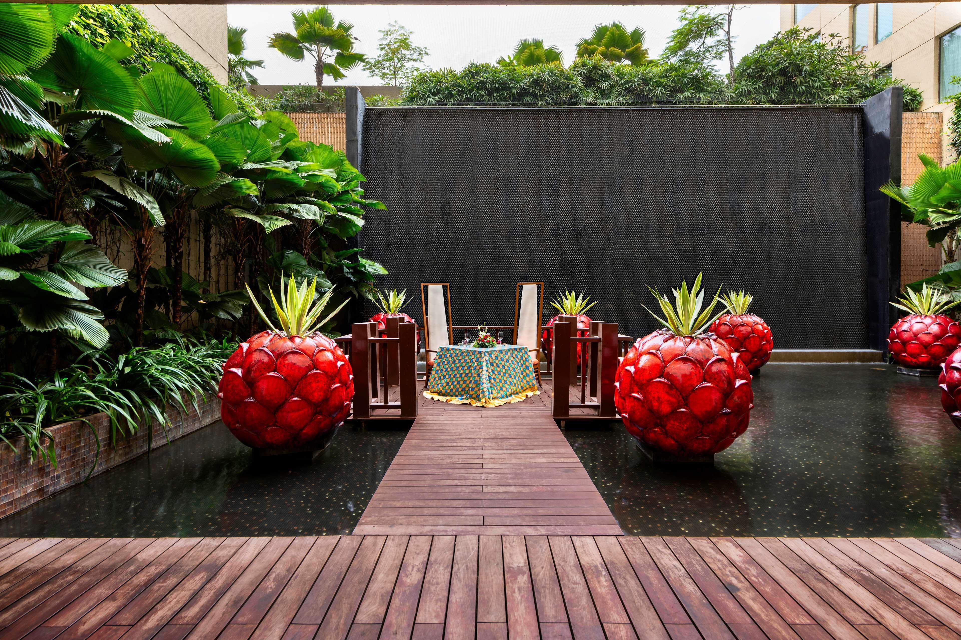 4 restaurants, breakfast, lunch, dinner served; Indian cuisine 