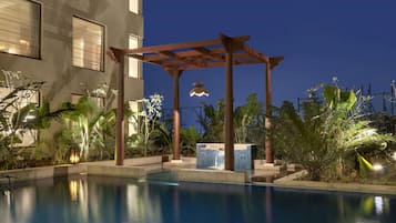 Outdoor pool, free pool cabanas, pool umbrellas