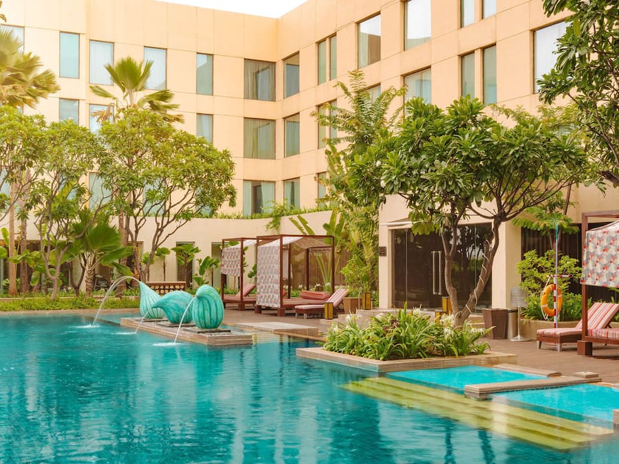 Outdoor pool, open 7:00 AM to 9:00 PM, free cabanas, pool umbrellas
