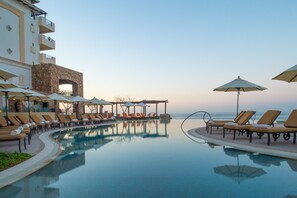 7 outdoor pools, open 9 AM to 9 PM, pool cabanas (surcharge)