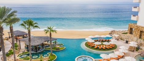7 outdoor pools, open 9 AM to 9 PM, cabanas (surcharge), pool umbrellas