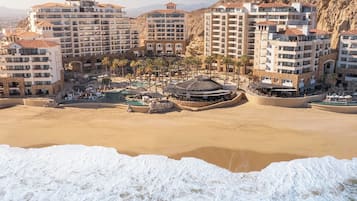 Praia particular, toalhas de praia, prática de pesca