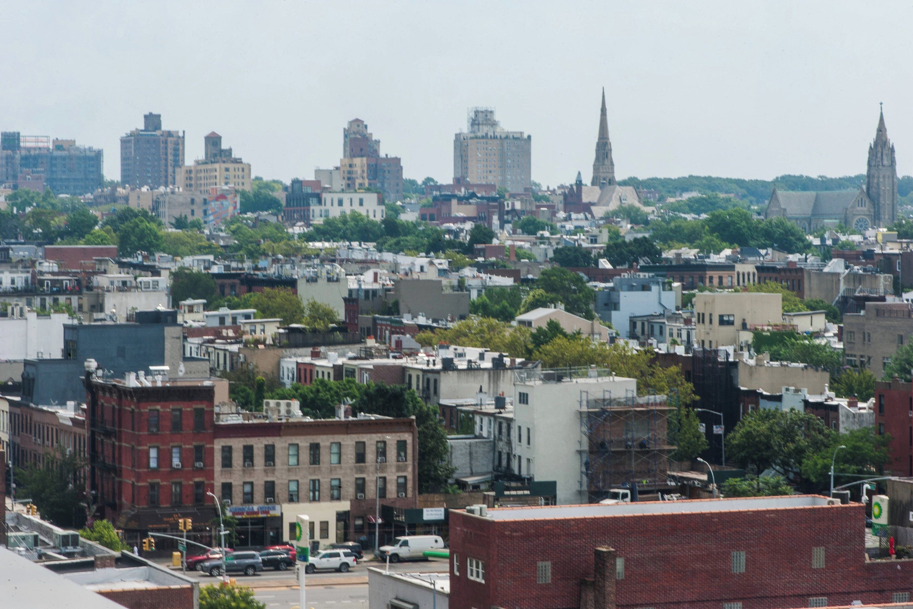 A cityscape with a variety of building types, including residential and commercial structures.
