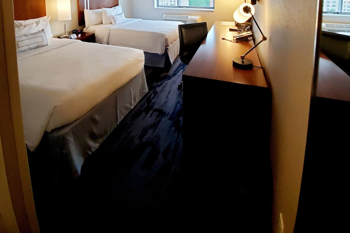 Premium bedding, down comforters, pillowtop beds, desk