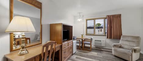 Room, 1 King Bed | Desk, blackout drapes, iron/ironing board, free WiFi