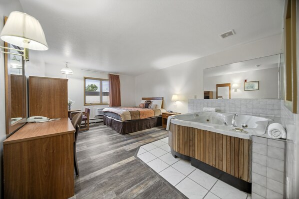 Suite, 1 King Bed | Desk, blackout drapes, iron/ironing board, free WiFi - Executive Inn Cass City (Cass City)