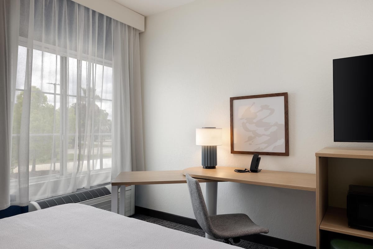 Premium bedding, desk, blackout curtains, iron/ironing board