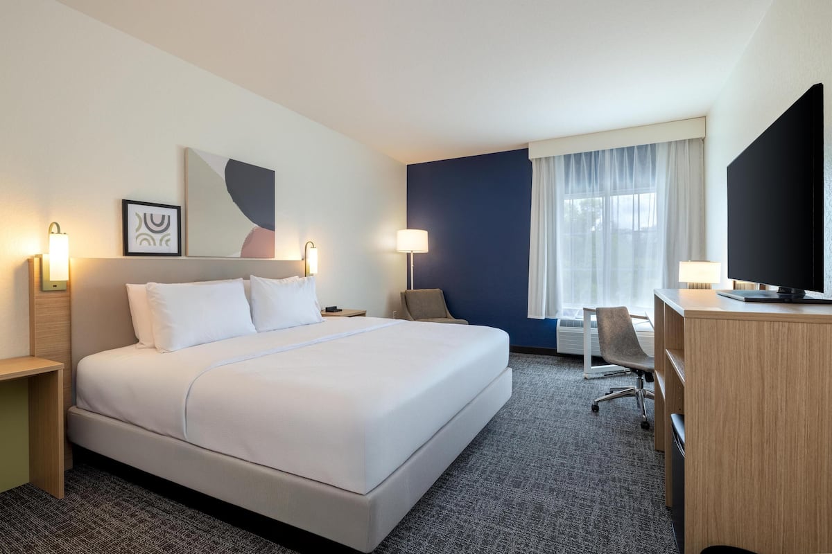 Premium bedding, desk, blackout curtains, iron/ironing board