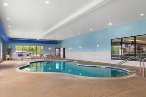 Indoor pool, open 7 AM to 11 PM, pool loungers
