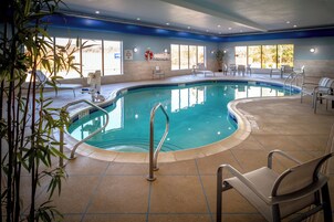 Indoor pool, open 7 AM to 11 PM, sun loungers