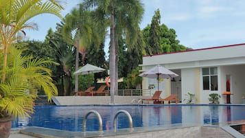 Outdoor pool, pool umbrellas, pool loungers