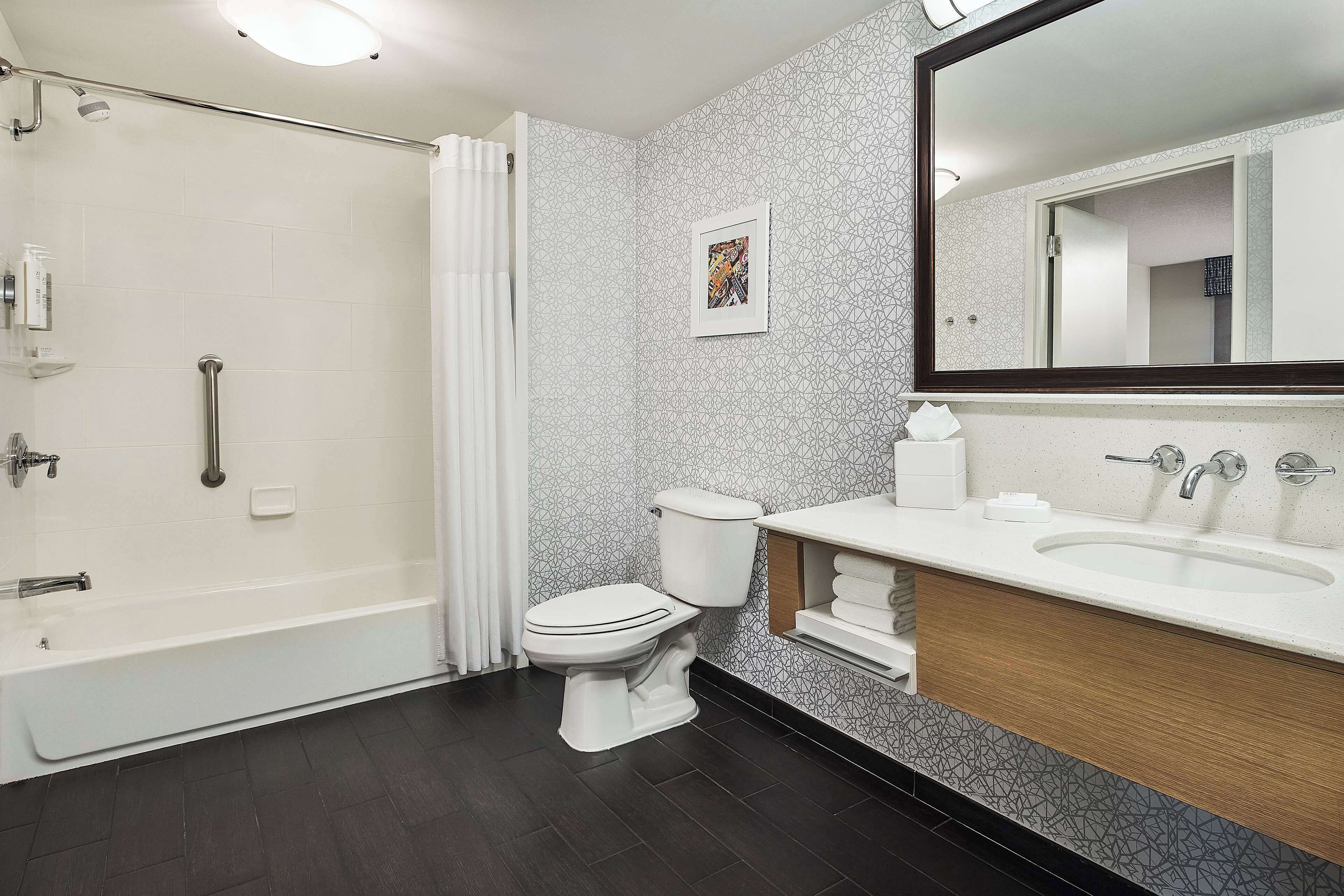 suite, 1 king bed, non smoking, microwave | bathroom shower