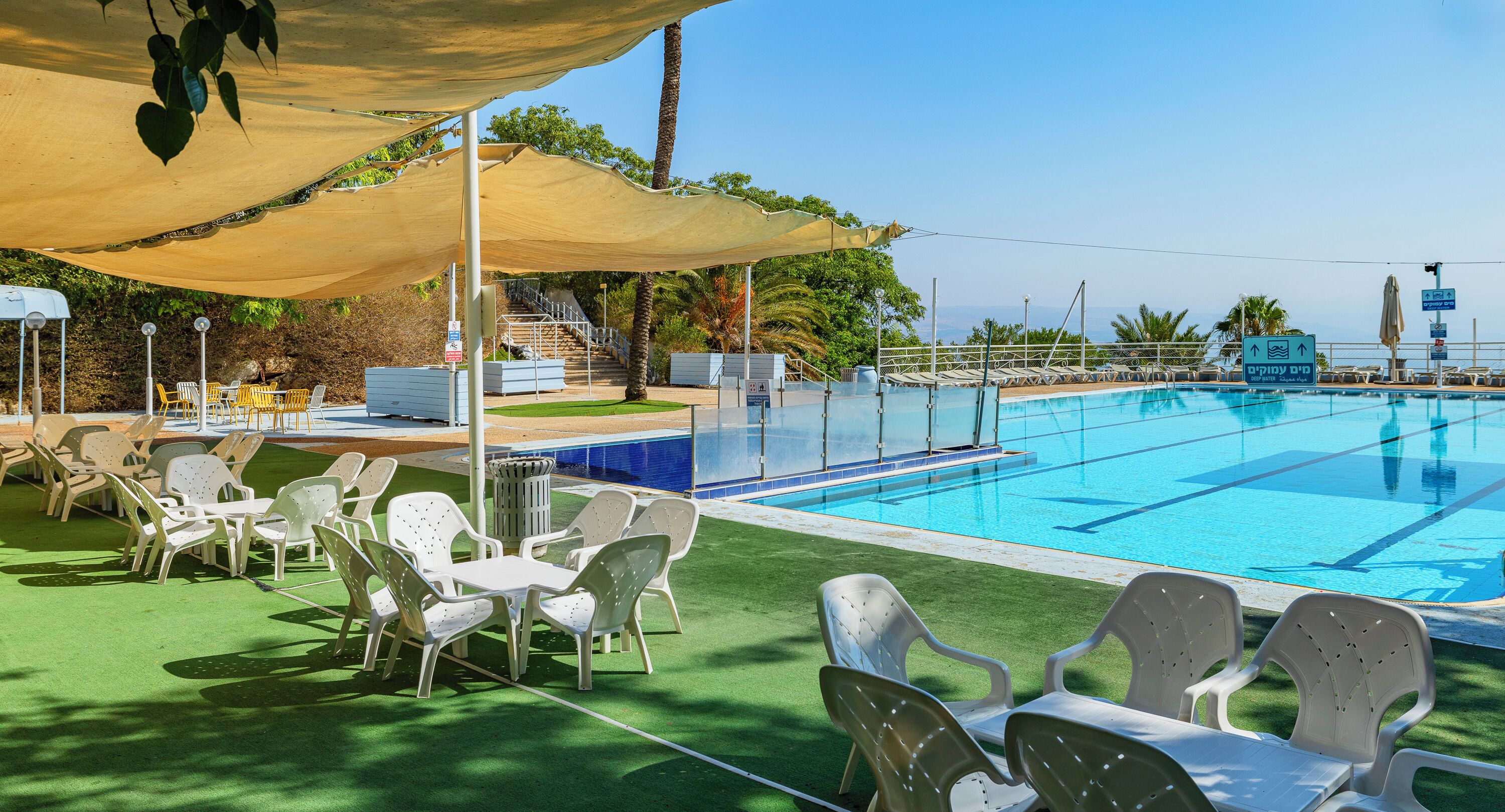 Seasonal outdoor pool, pool umbrellas, sun loungers