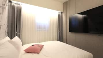 Chambre Double Deluxe | Literie de qualité supérieure, minibar, rideaux occultants