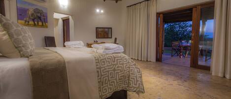 Signature Room | 1 bedroom, down comforters, Select Comfort beds, in-room safe