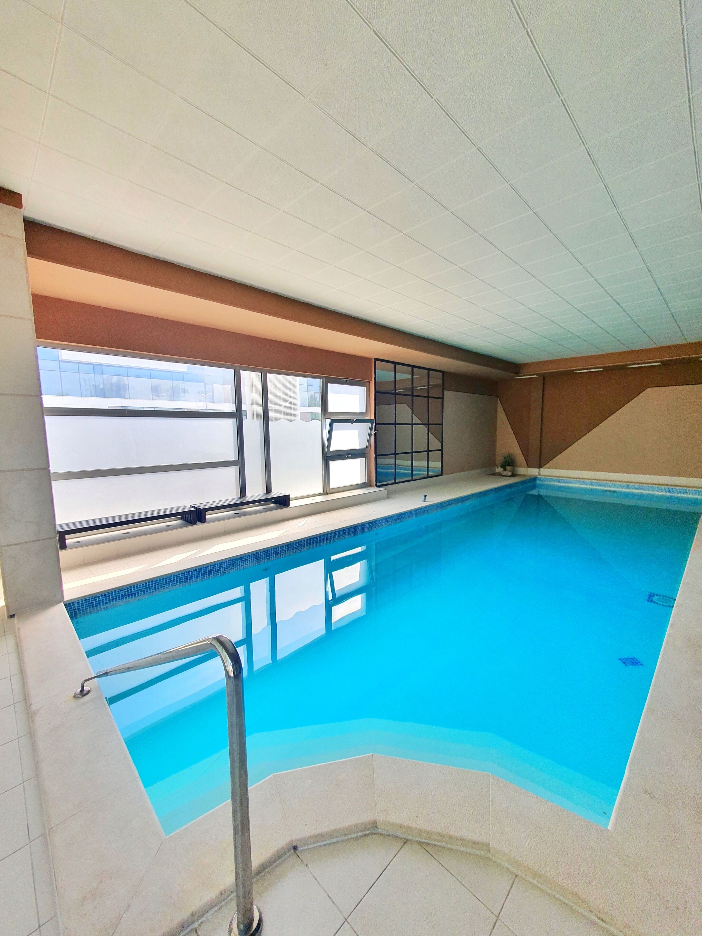 Indoor pool, open 9:00 AM to 9:00 PM, sun loungers