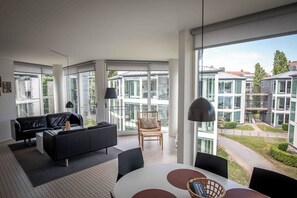 Apartment, 2 Bedrooms, Partial Lake View (4 Beds Lake view) | Living area | 42-inch TV with digital channels, streaming services - Kolding Hotel Apartments (Kolding)