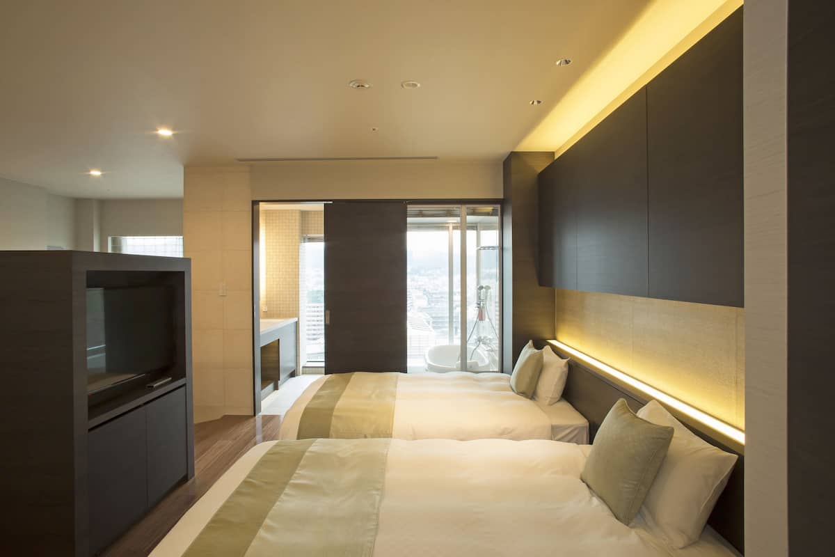 13th Floor Junior Suite, City View, Non Smoking | Premium bedding, down duvets, in-room safe, blackout curtains