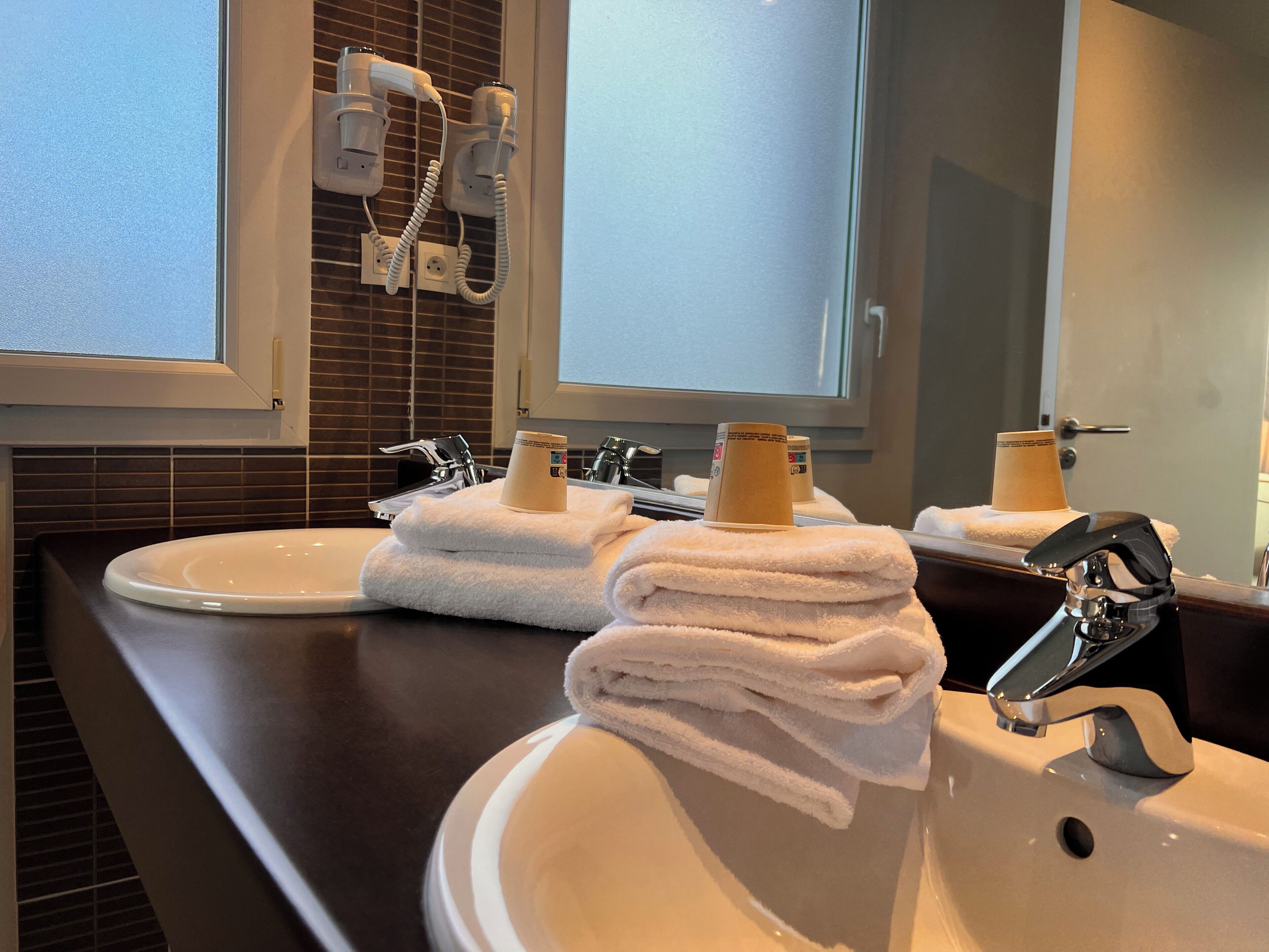 family room | bathroom | hair dryer, towels, soap, shampoo
