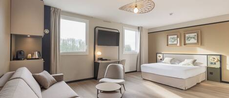 Executive Quadruple Room | Premium bedding, individually furnished, desk, laptop workspace