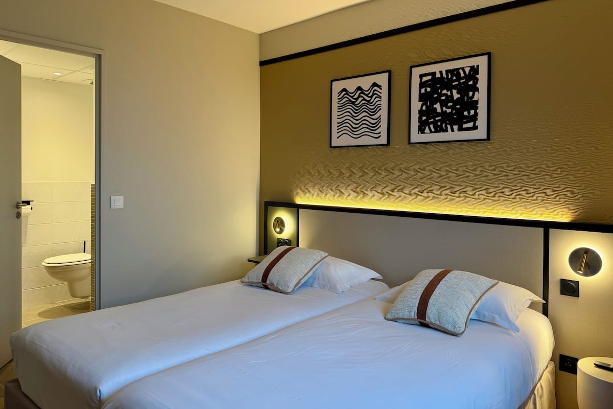 Premium bedding, individually furnished, desk, laptop workspace