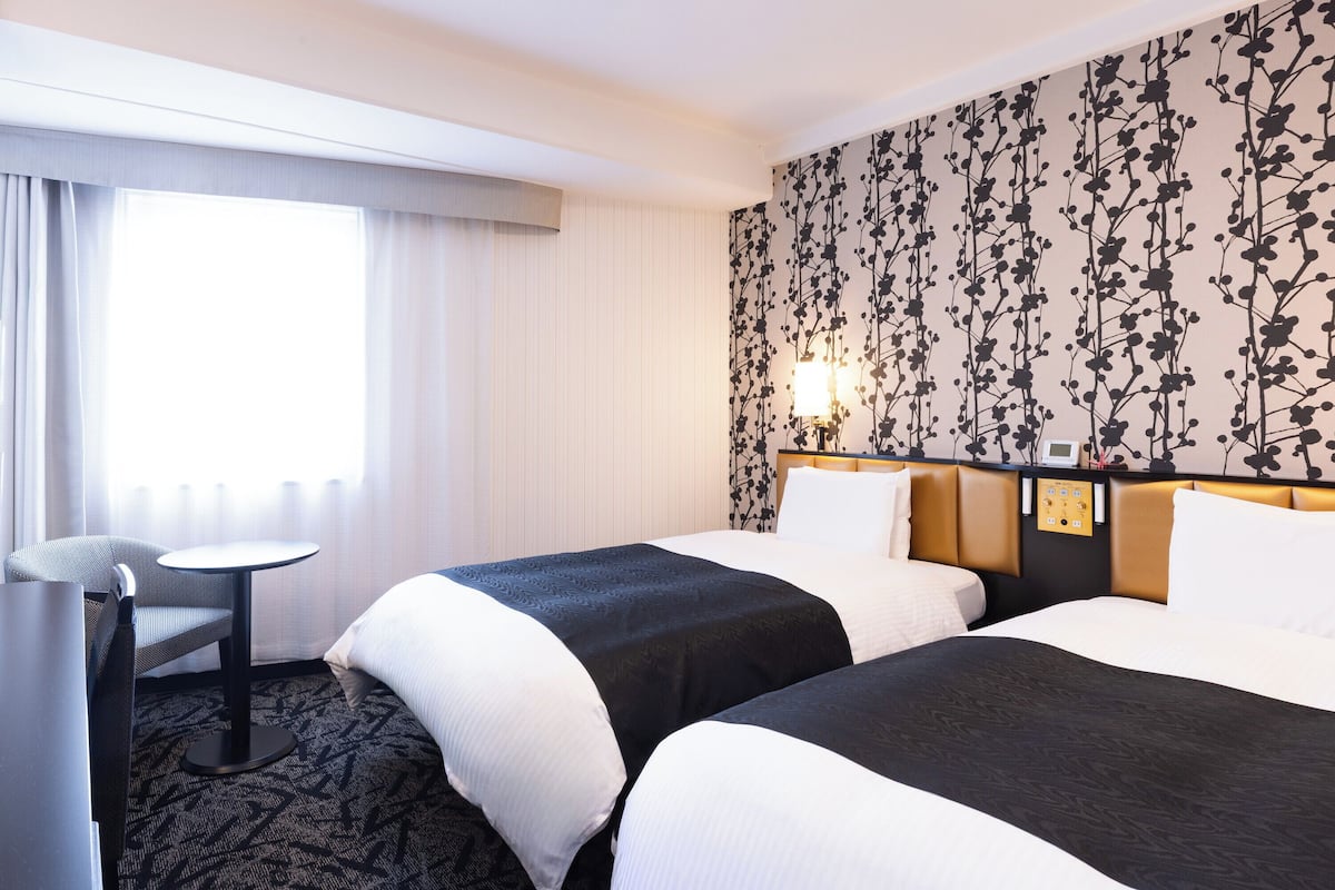 Down duvets, desk, blackout curtains, iron/ironing board