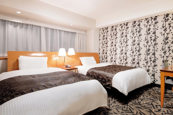 Down comforters, desk, blackout drapes, free WiFi