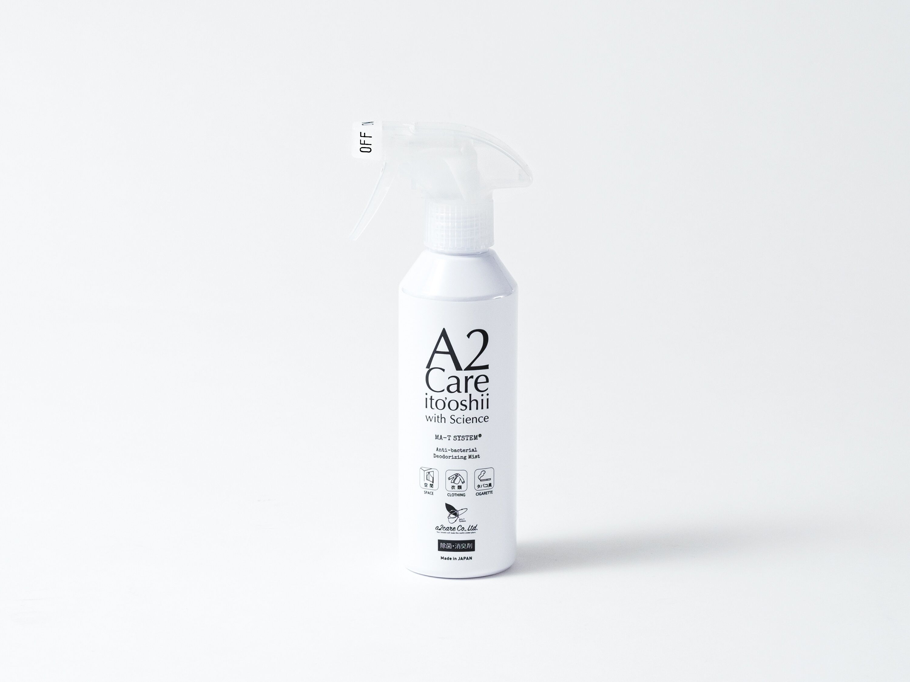 A white spray bottle labeled "A2 Care itoshii with Science" with a spray nozzle and a label indicating it is an anti-bacterial deodorizing mist.