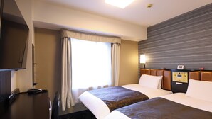 A hotel room with two beds, a flat-screen TV, a control panel on the wall, and a window with curtains. - APA Hotel Chiba Yachiyo Midorigaoka (Yachiyo)