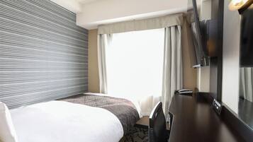 Single Room, Non Smoking | Down comforters, desk, blackout drapes, free WiFi