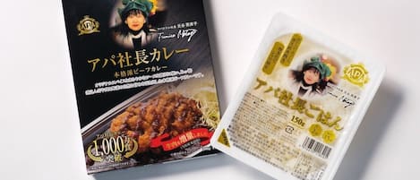 A package of food with Japanese text and a picture of a person wearing a hat.