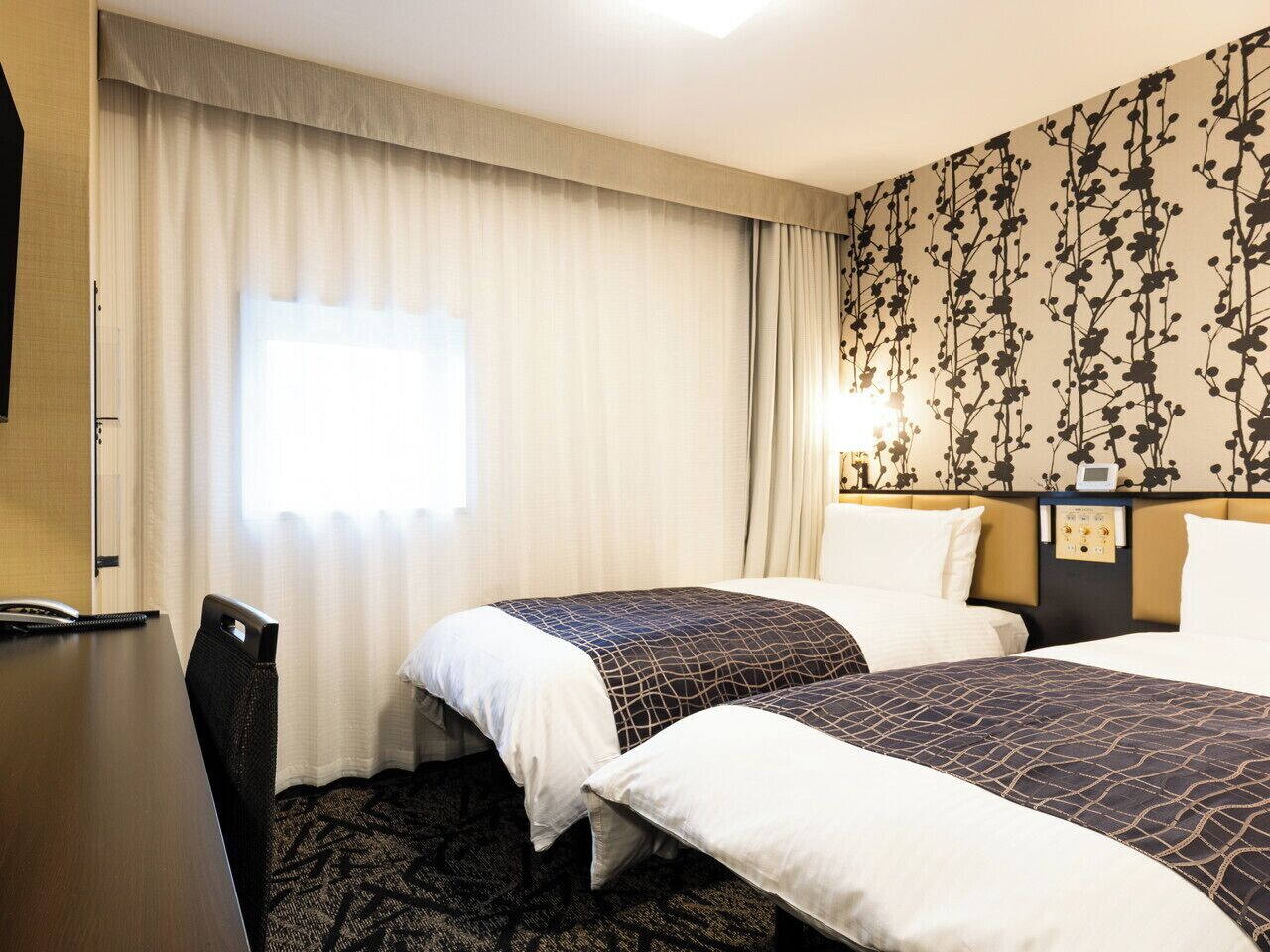 Copriletto in piuma, una scrivania, tende oscuranti, Wi-Fi gratuito