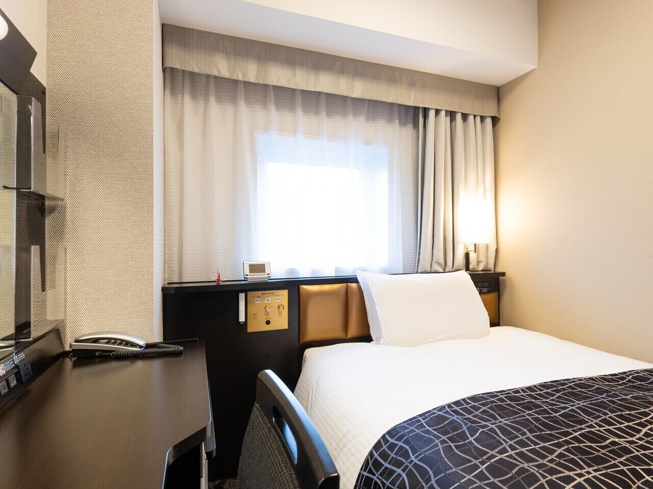 Copriletto in piuma, una scrivania, tende oscuranti, Wi-Fi gratuito