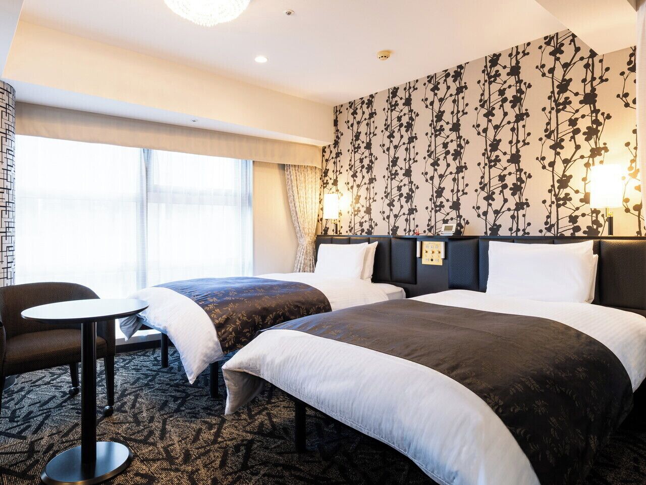 Copriletto in piuma, una scrivania, tende oscuranti, Wi-Fi gratuito