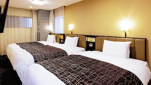 A hotel room with two beds, a flat-screen TV, and a minibar. - APA Hotel Saga Ekimae Chuo (Saga)