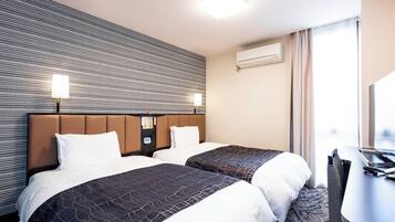 Twin Room, Multiple Beds, Non Smoking | Down duvets, desk, blackout curtains, free WiFi