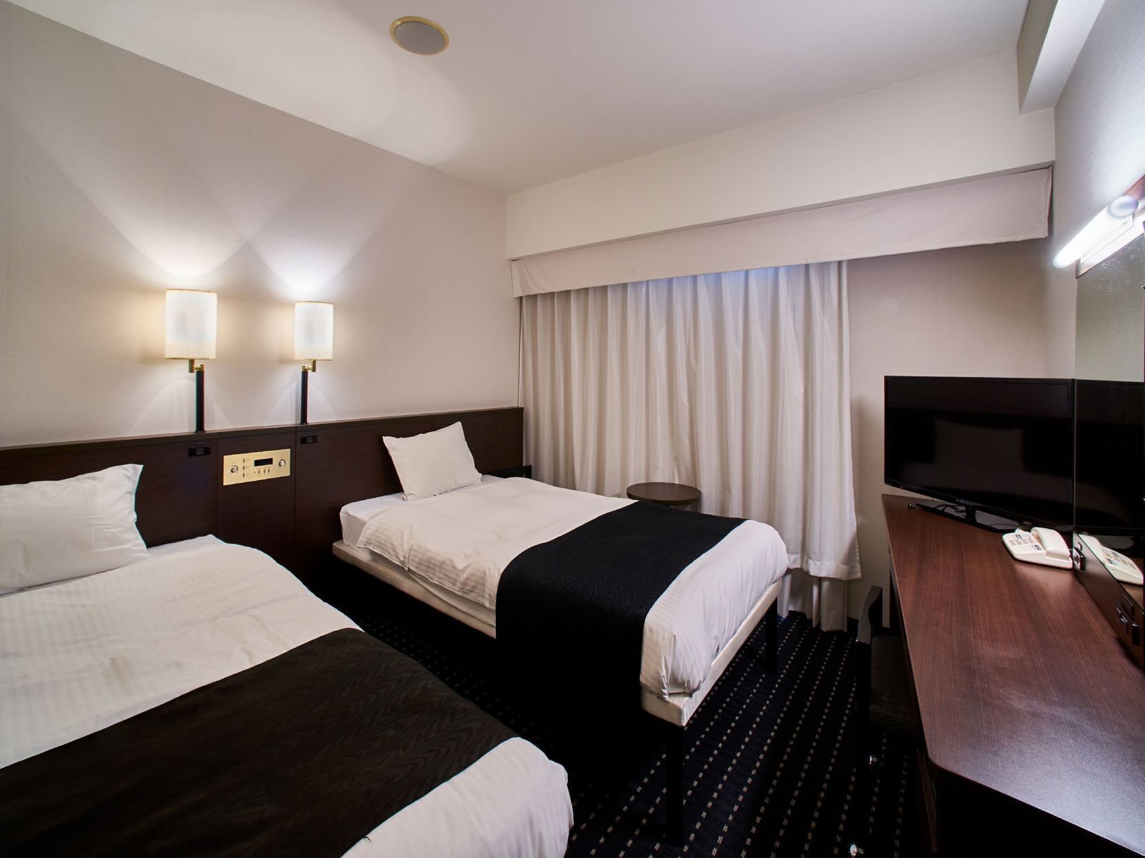 Down comforters, desk, blackout drapes, free WiFi
