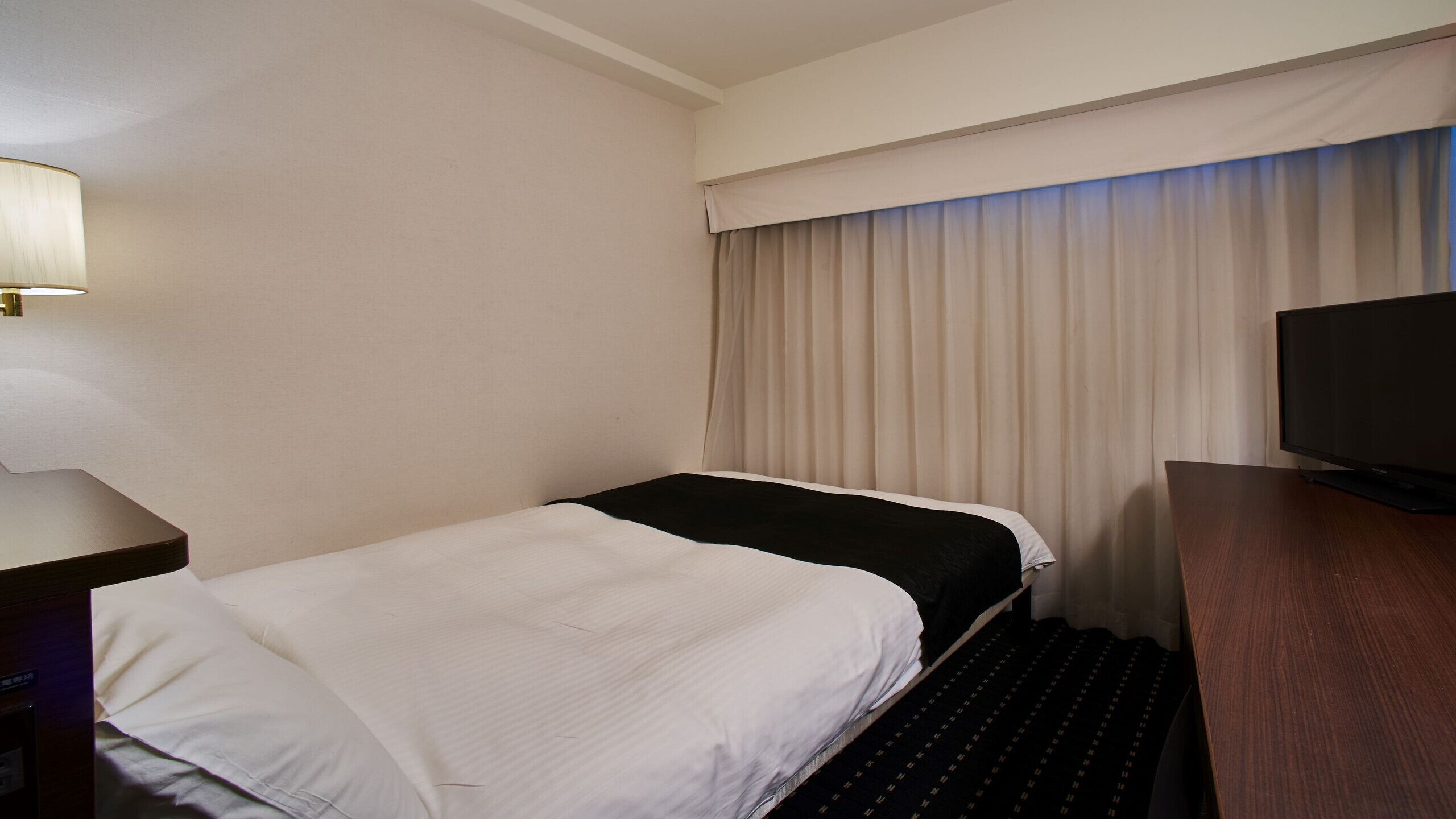 Down comforters, desk, blackout drapes, free WiFi