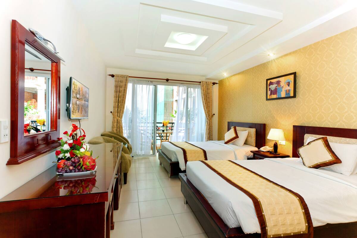 Deluxe Double or Twin Room, Balcony | Minibar, in-room safe, desk, blackout drapes