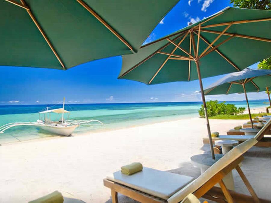 En privat strand, kajakroning, roning/kanosejlads