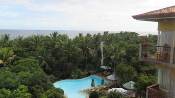 Outdoor pool, pool umbrellas, sun loungers