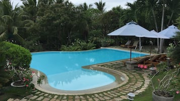 Outdoor pool, pool umbrellas, sun loungers