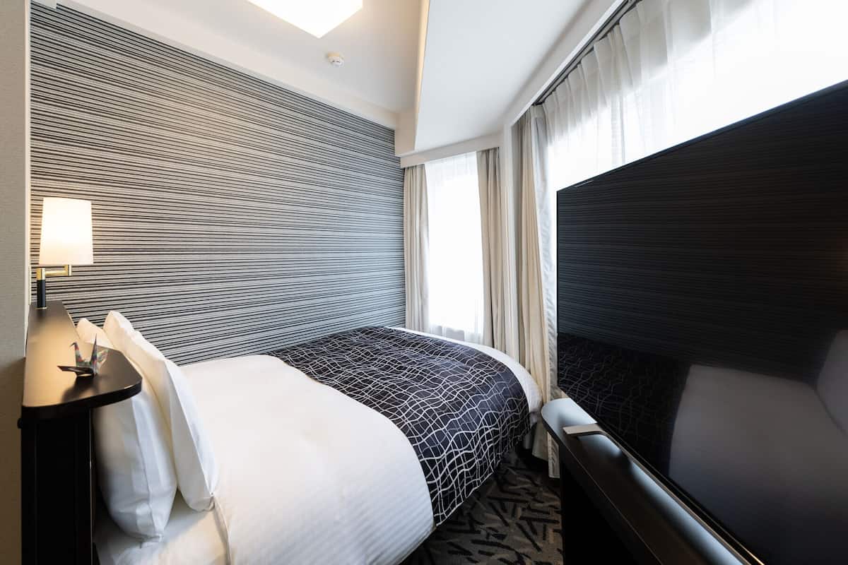 Desk, blackout drapes, free WiFi, bed sheets