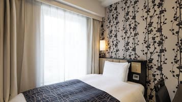 Desk, blackout drapes, free WiFi, bed sheets