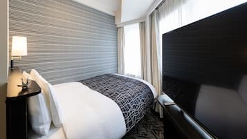 Desk, blackout curtains, free WiFi, bed sheets