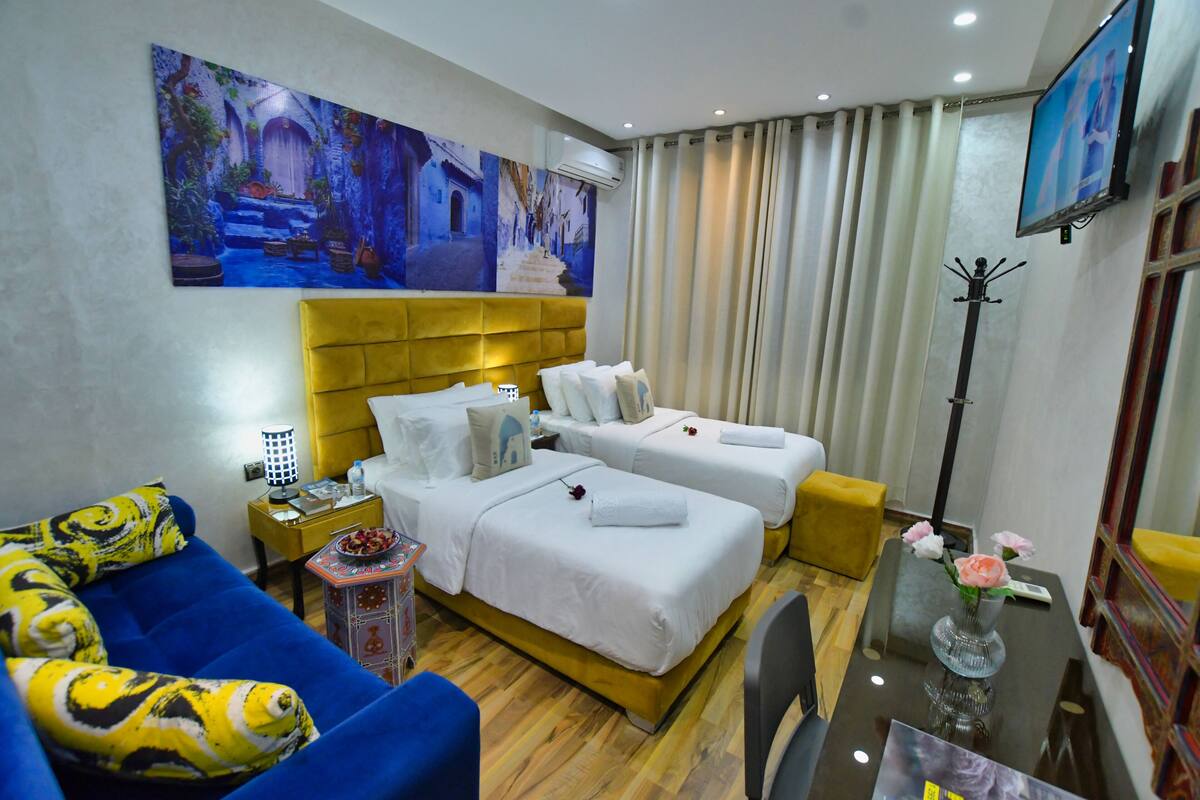Junior Twin Room, 2 Twin Beds | Down comforters, blackout drapes, WiFi (free), bed sheets