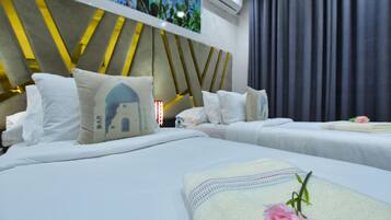Junior Twin Room, 2 Twin Beds | Down comforters, blackout drapes, free WiFi, bed sheets