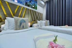 Junior Twin Room, 2 Twin Beds | Down comforters, blackout drapes, free WiFi, bed sheets