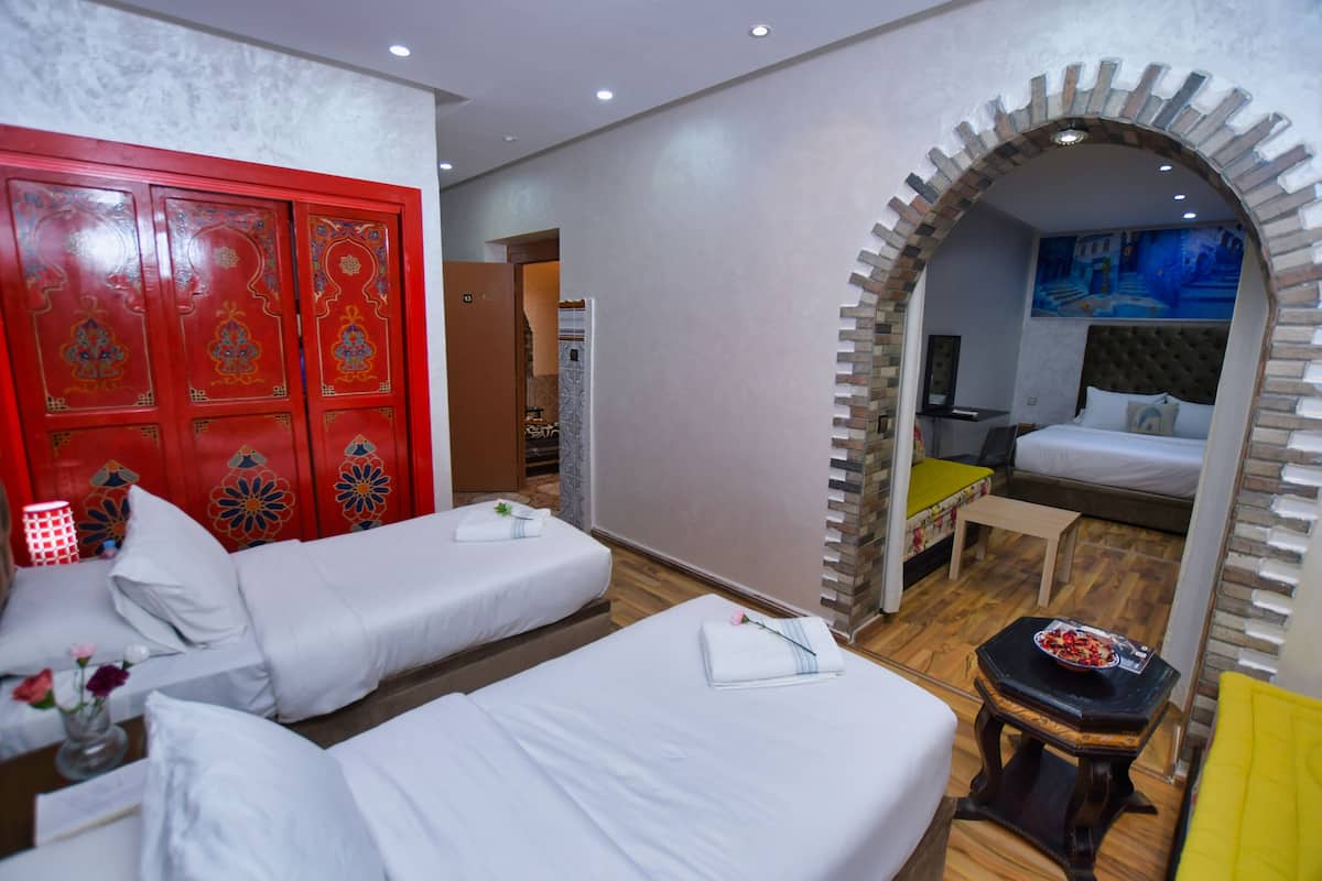 Family Suite | Down comforters, blackout drapes, WiFi (free), bed sheets
