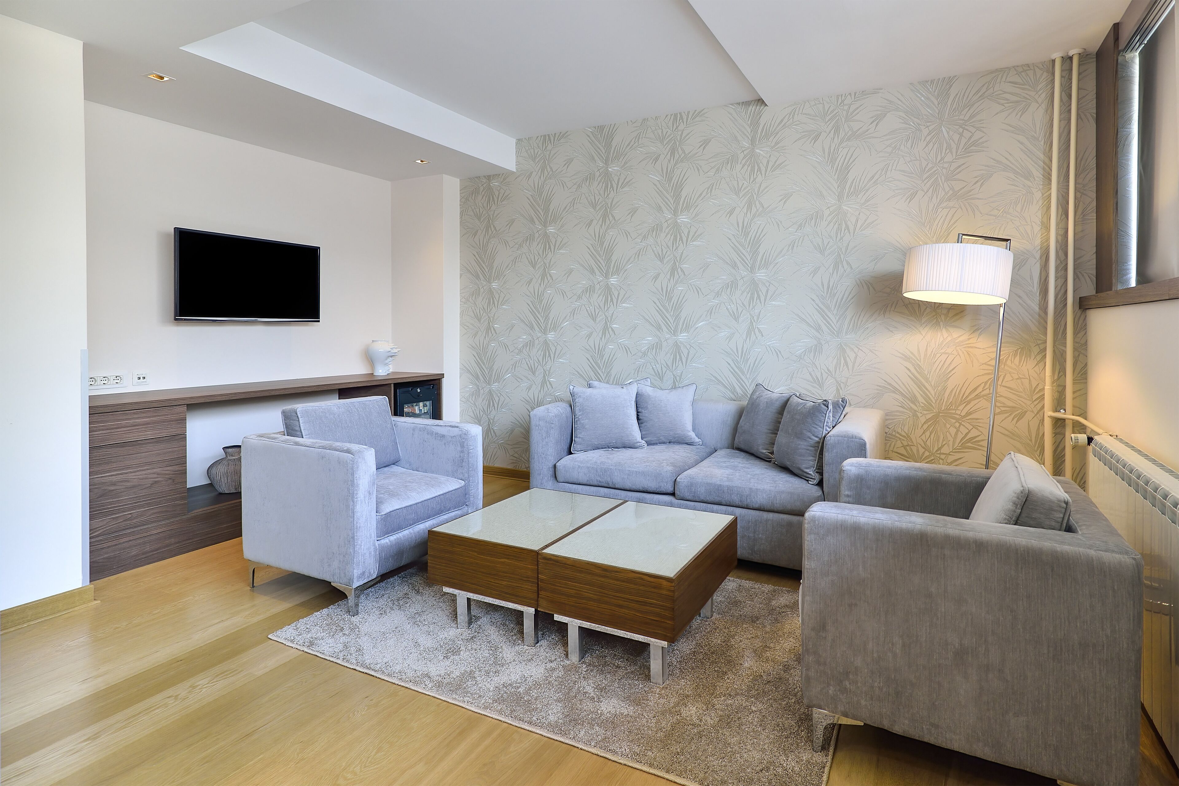 suite, 1 bedroom, balcony, city view | living room | 40-inch lcd tv with cable channels, tv, first-run films